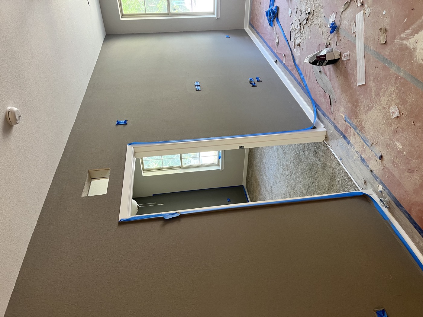 Mid-project room with painter's tape up